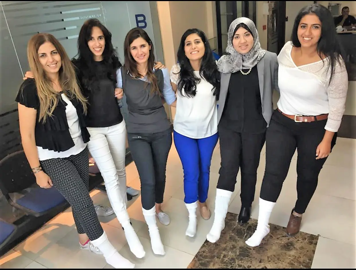 Supporters wearing white socks